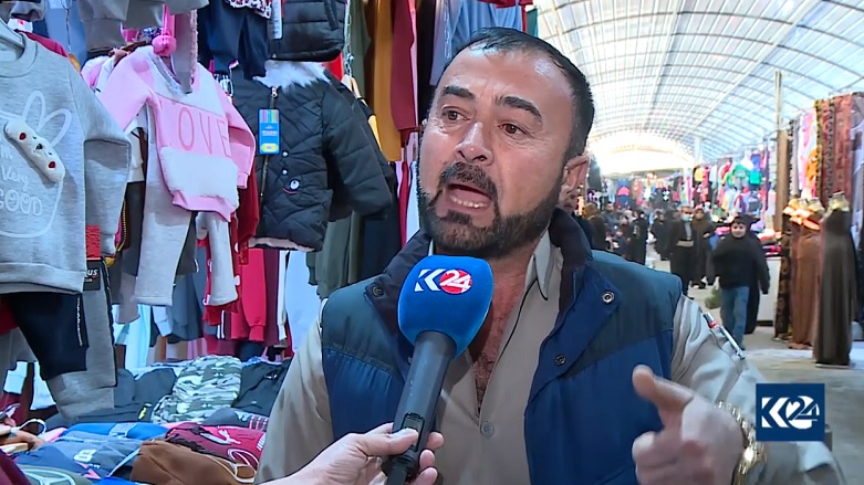 كاسبكارێكی بازاڕی سیمی هه‌ولێر